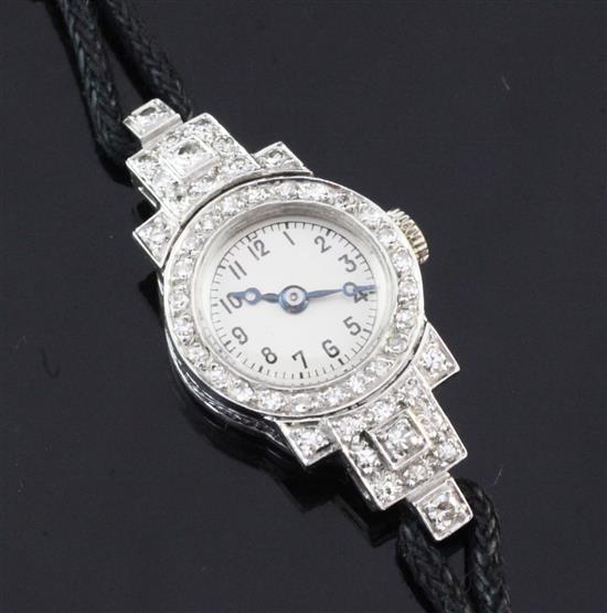 An Art Deco platinum and diamond set cocktail watch,